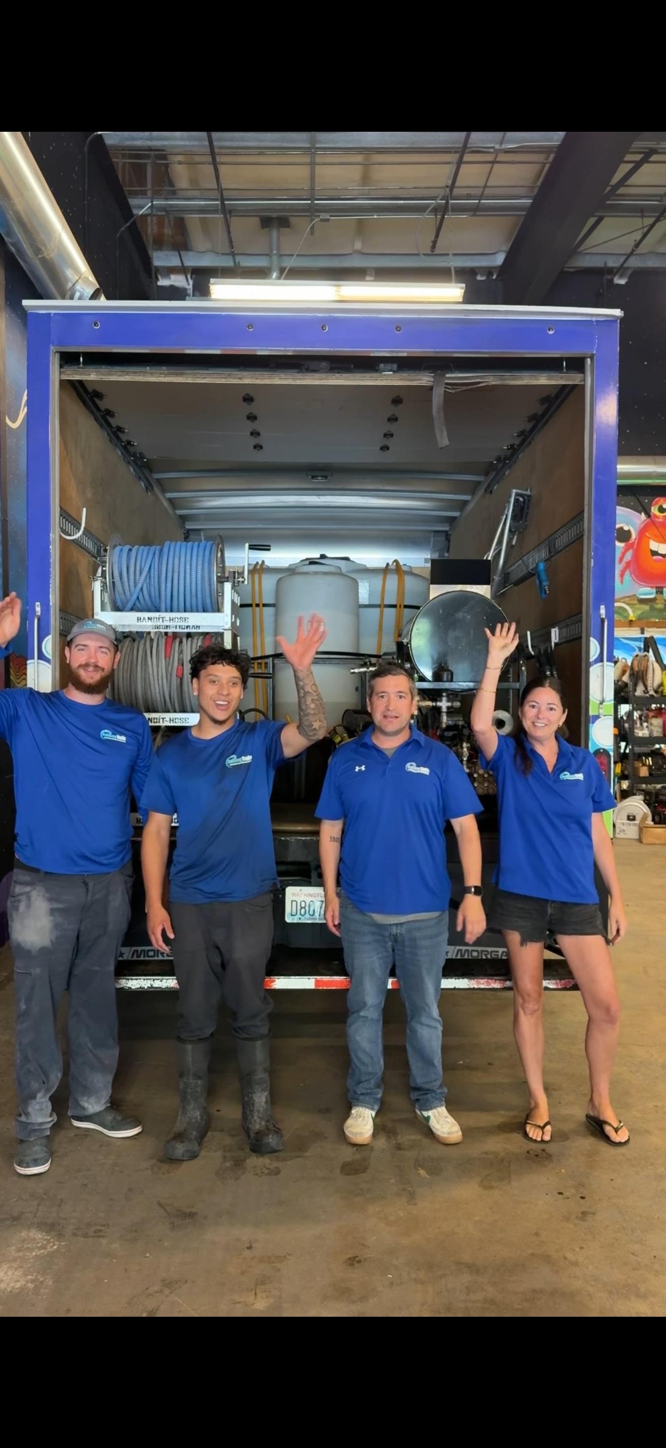 Rolling Suds Seattle crew with service truck and equipment